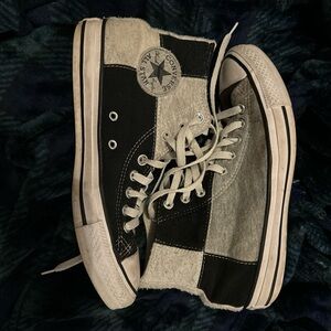 Black and white high top converse